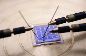 World record value for the open-circuit voltage of 582 mV for c-Si on glass