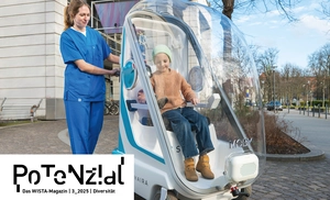 Kind in einer mobilen Schutzkapsel, das von medizinischem Personal geschoben wird.